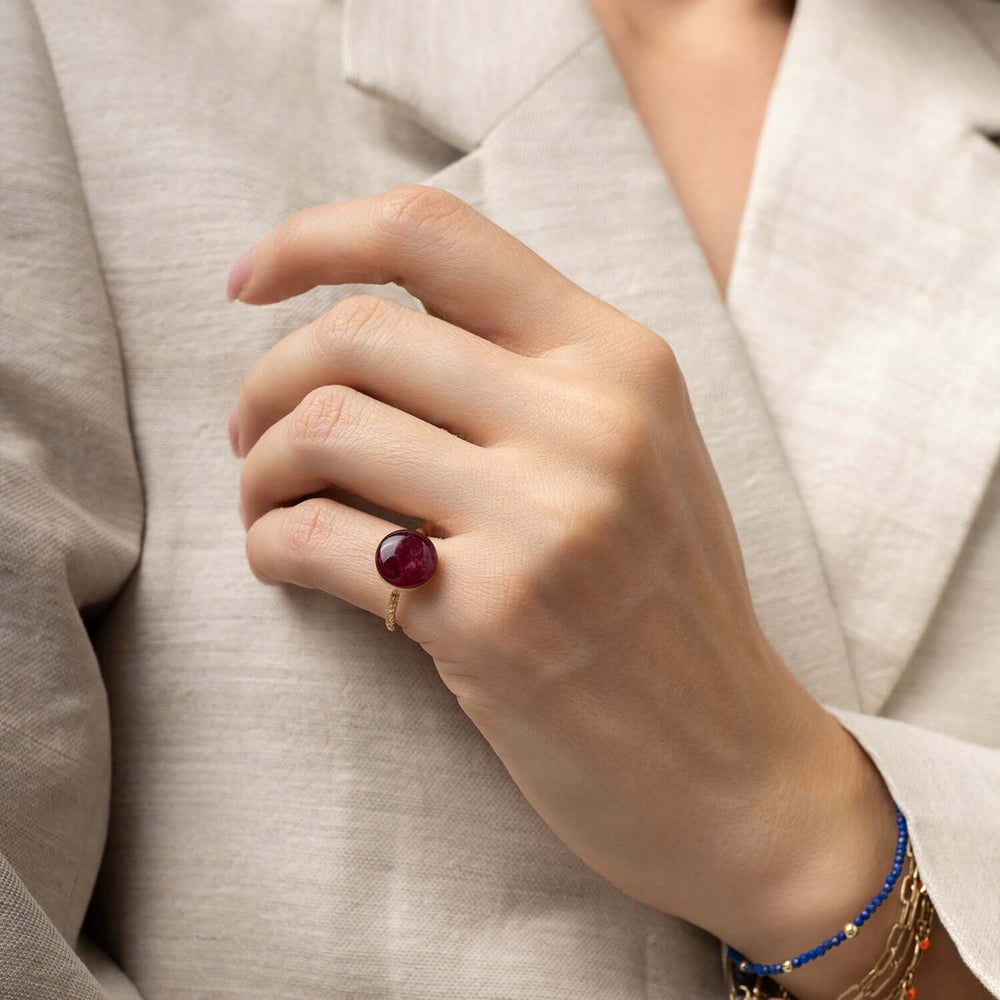 Handcrafted crushed ruby disco ring with sparkling red crushed stone inlay in gold-filled setting by Kate Koel