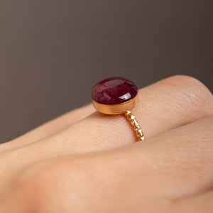 Handcrafted crushed ruby disco ring with sparkling red crushed stone inlay in gold-filled setting by Kate Koel
