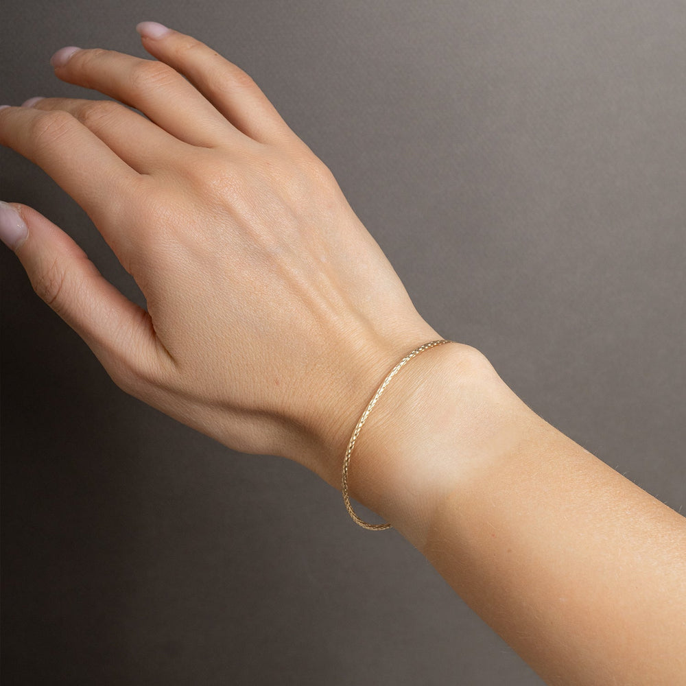 Bold handcrafted snake skin textured cuff bracelet in mixed metals with adjustable fit by Kate Koel