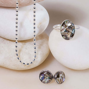 Handcrafted statement abalone shell oval ring with genuine iridescent shell in mixed metal setting by Kate Koel