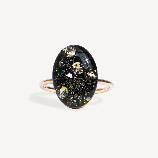 statement oval ring with  galaxy looking gemstone handmade by kate koel