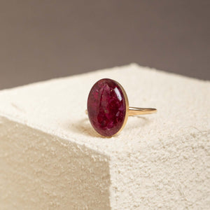 Handcrafted statement oval ruby ring with bold crimson setting in gold-filled band by Kate Koel