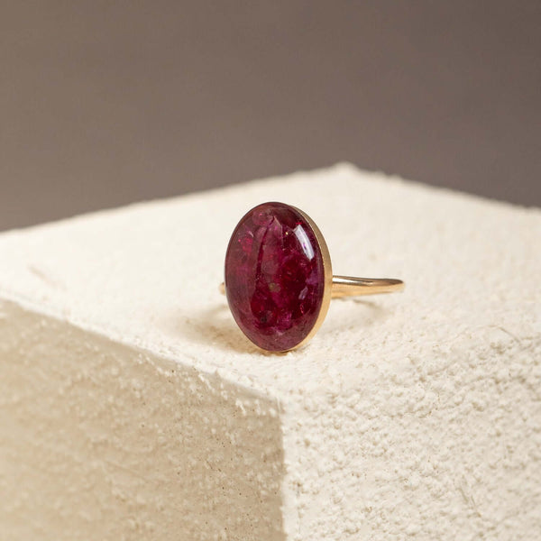 Handcrafted statement oval ruby ring with bold crimson setting in gold-filled band by Kate Koel