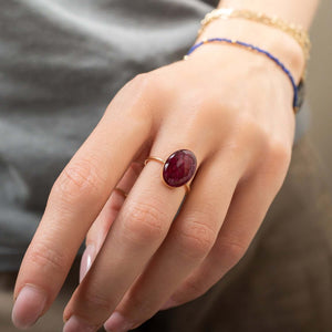 Handcrafted statement oval ruby ring with bold crimson setting in gold-filled band by Kate Koel