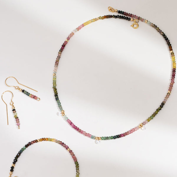 Multicolored Watermelon Tourmaline Beaded Necklace and earrings on a white background