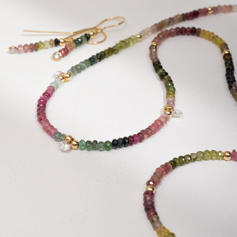Multicolored Watermelon Tourmaline Beaded Necklace and earrings on a white background