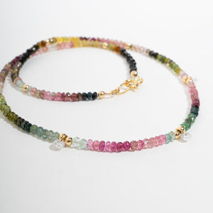 Multicolored Watermelon Tourmaline Beaded Necklace with gold accents on a white background