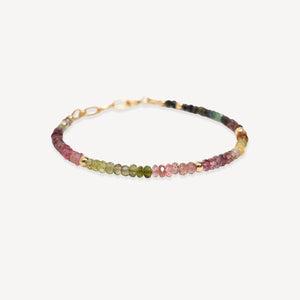 Multicolored beaded bracelet on a white background