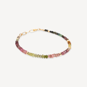 Multicolored beaded bracelet on a white background