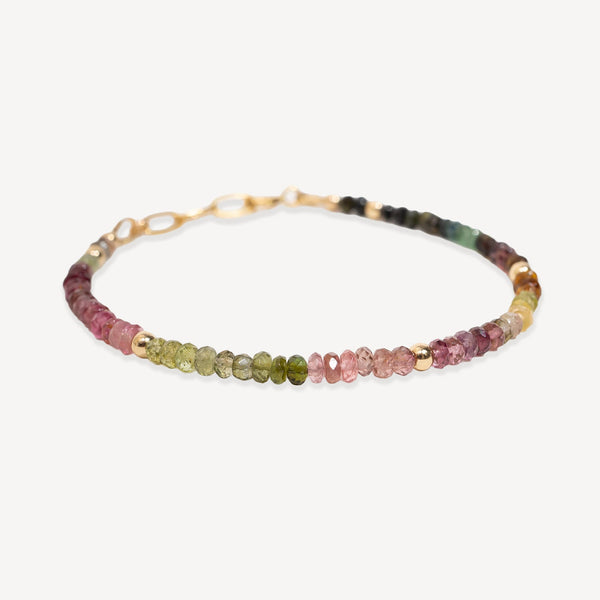 Multicolored beaded bracelet on a white background