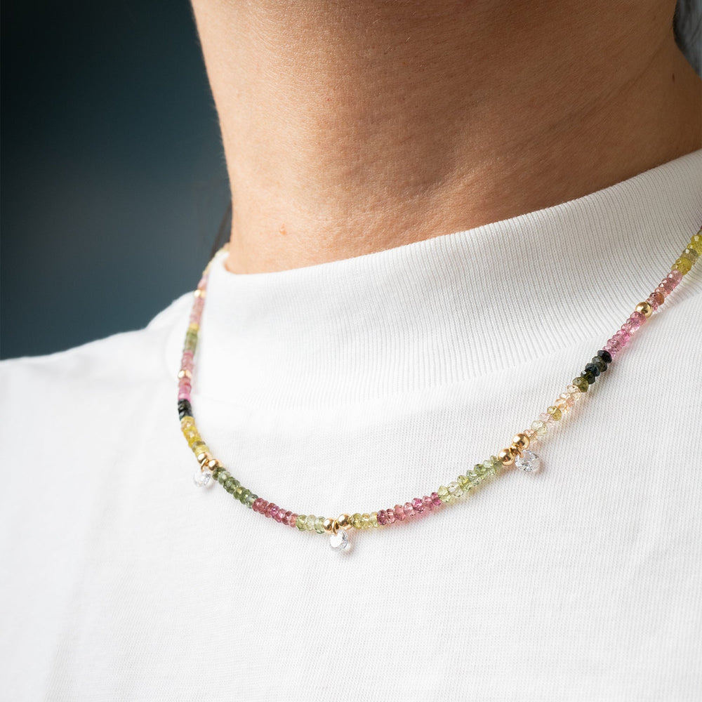 Multicolored Watermelon Tourmaline Beaded Necklace and earrings on a white background
