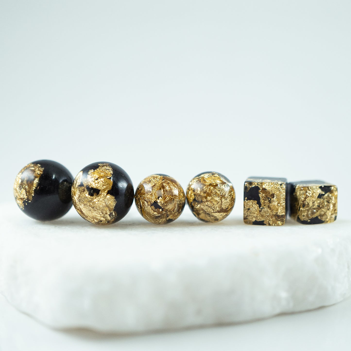 
                  
                    Black and Gold Earrings
                  
                