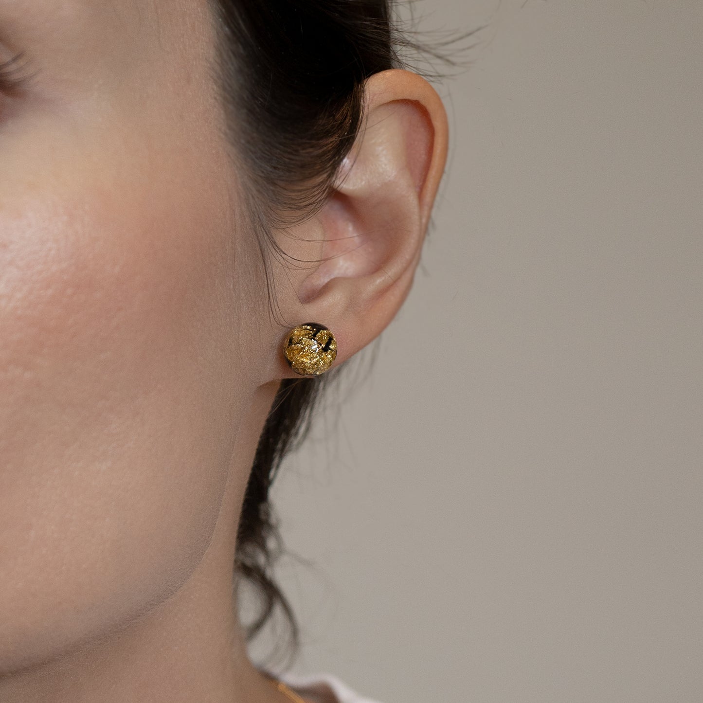 
                  
                    large round Black and Gold Earrings
                  
                