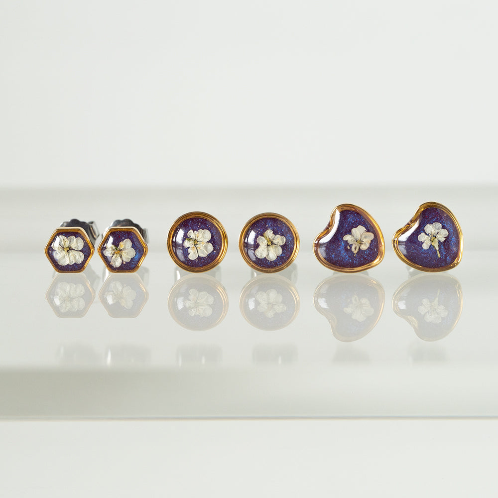 Purple flower earrings in gold