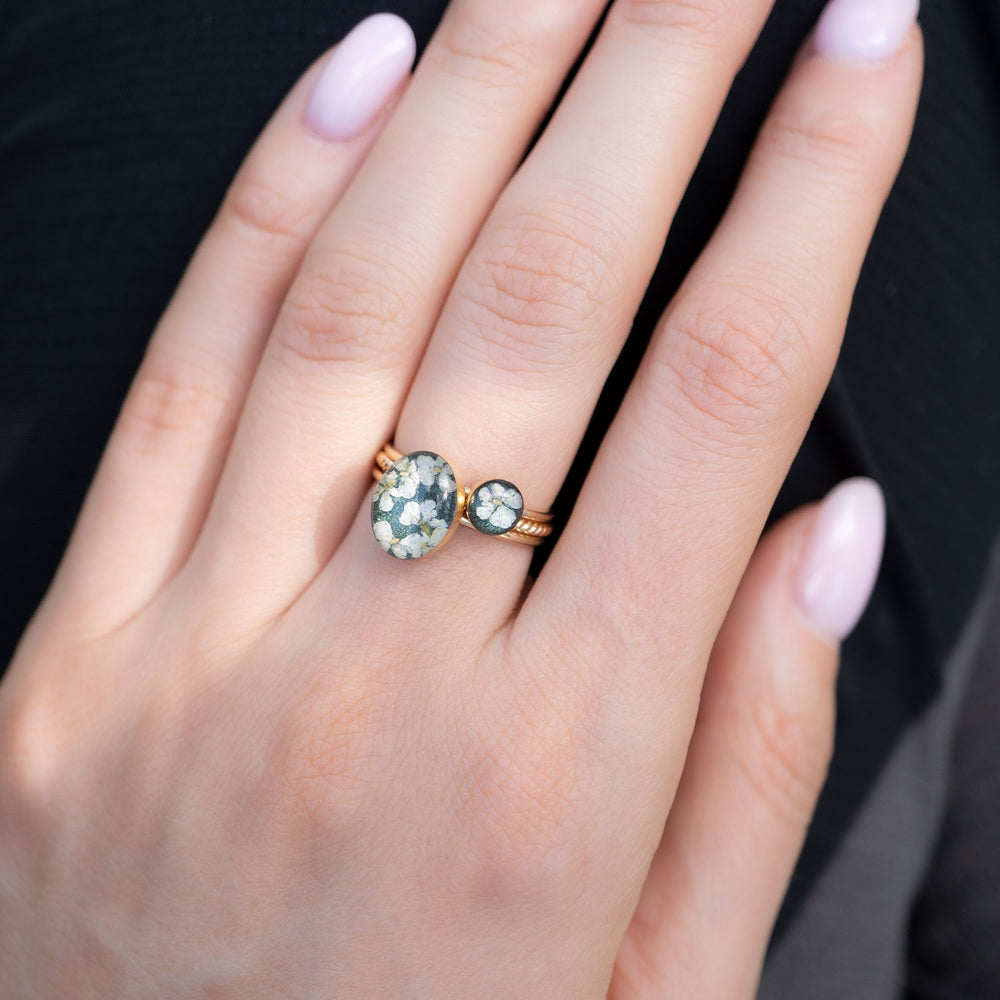
                      
                        Oval Green Flower Ring
                      
                    