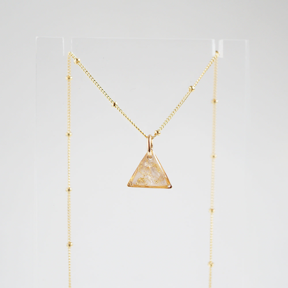 
                  
                    Pearl and Gold Leaf Triangle Necklace
                  
                