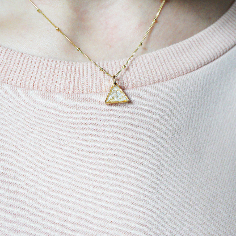 
                  
                    Pearl and Gold Leaf Triangle Necklace
                  
                